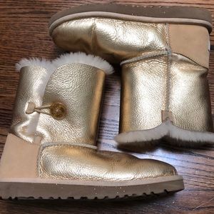 Gold UGG Button Up Boots. NWOT size 4